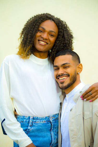 istock two lgbt friends pose for a portrait smiling 2171576370