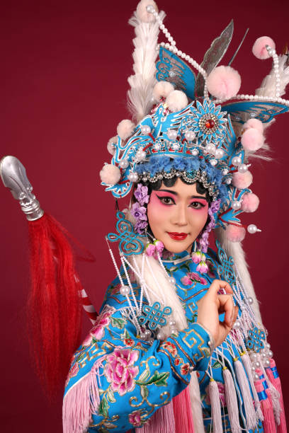 istock A Beijing opera actress is performing on stage 2171604342