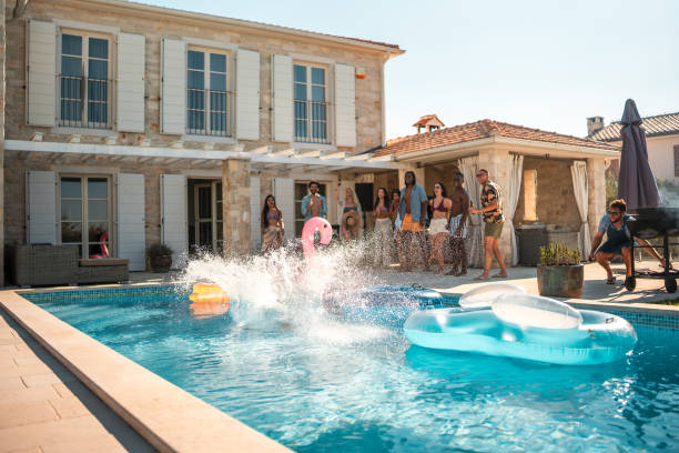 istock Cheerful Black Male's Cannonball Splash 2171605532