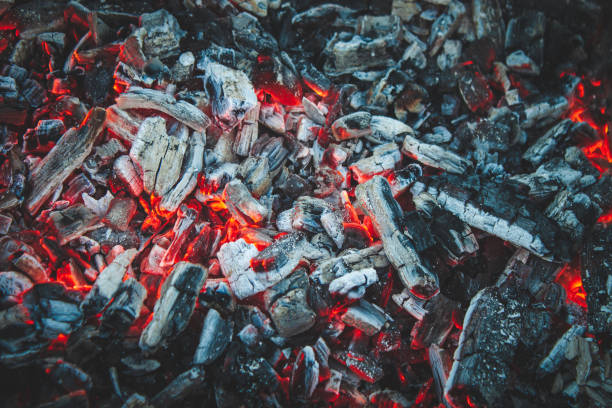 istock A smoldering red hot charcoal for barbecue top view 2171605829