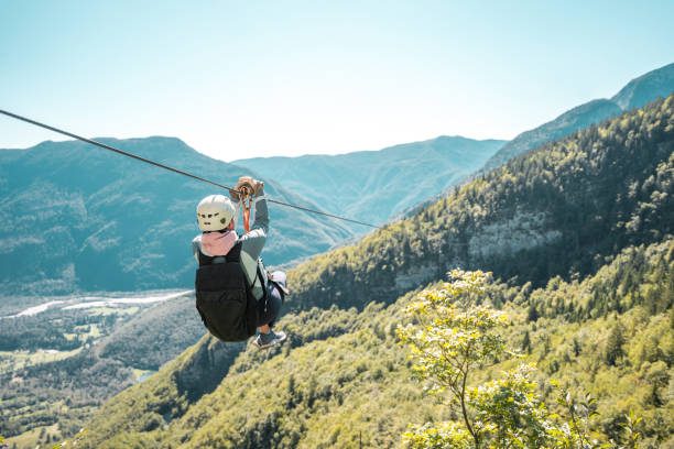 istock Young Mixed Race Female Sliding Through Mountain Realms While Chasing Panoramic Thrills 2171606870