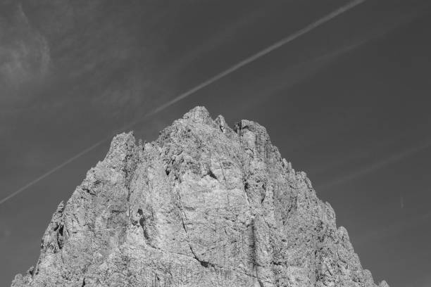 italian alps with plane in black and white