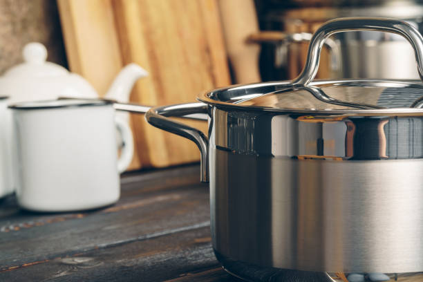 istock Set of stainless steel saucepans in a kitchen 2171610192
