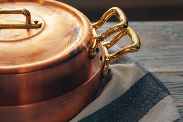 istock New copper cookware for professional kitchen close up 2171610446