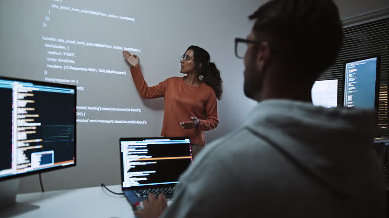 coder casual dress code Confident Woman Programmer in Casual Outfit Working at Home Office with Computer on Coding Project Stock Photo