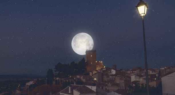 istock village at night with full moon 2171613128