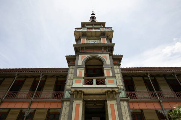 Orizaba, Veracruz, Mexico - July 14, 2022: Cloudy sun shines on the historic 1894 city hall, designed by Gustave Eiffel, known as the Iron Palace.