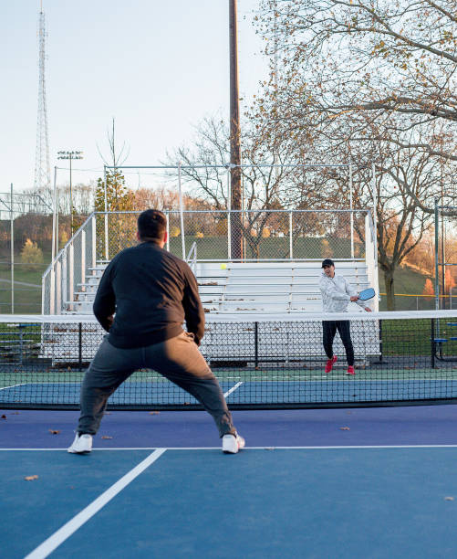 istock Hispanic brothers playing pickleball outside 2171616495