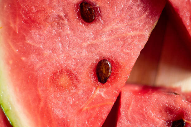 Sliced ripe watermelon with seeds close-up