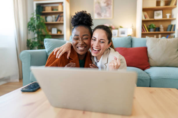 istock Diverse Female Entrepreneurs Exuberant in Home Business Setting 2171618172