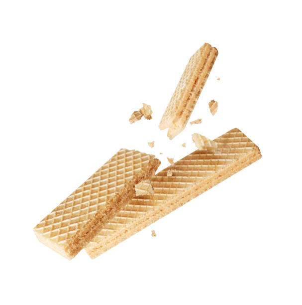 istock Crispy waffles crushed in the air isolated on white background 2171618582