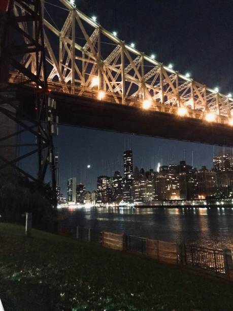istock Illuminated Bridge Over a Serene Cityscape 2171618739
