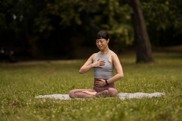 istock Woman doing yoga in nature. 2171621949