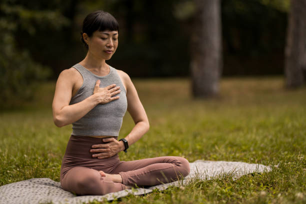 istock Woman doing yoga in nature. 2171622325