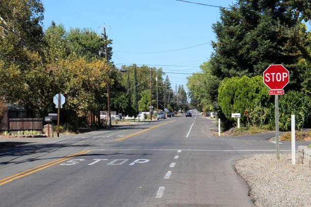 istock Intersection with Stop sign. Photo on a sunny day 2171622496