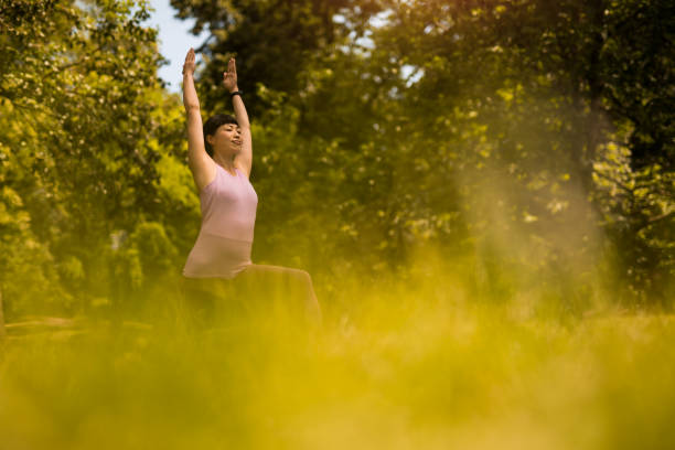 istock Woman doing yoga in nature. 2171622618