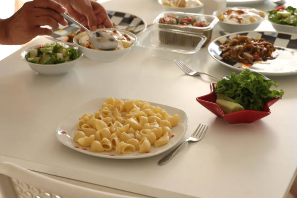 istock Pasta and salads on a table prepared for lunch 2171626750