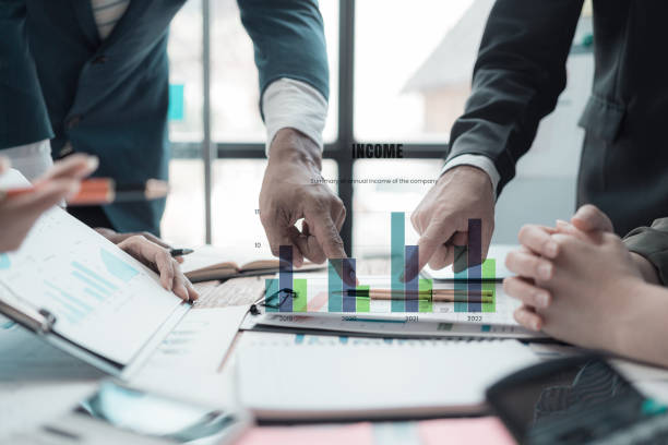 istock ​​Multi-national sales team meets with the director, young professionals discuss work problems, analyze financial statistics, share creative brainstorming solutions. 2171629498