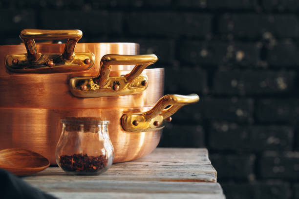 Close up of a set of copper cookware