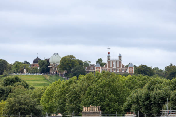 London, England, UK - July 25, 2024: This image shows a landscape hillside view of the Royal Observatory Greenwich in London from the Thames River.