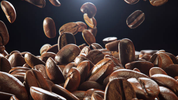 istock Close up Detail Shot of Coffee Beans Falling Down isolate on black background. 3D Render. 2171633920