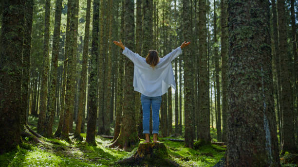 istock Joyful Woman in Forest Embrace 2171639468