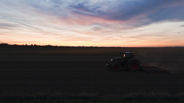 istock Nighttime Agricultural Fieldwork with Tractor 2171639928
