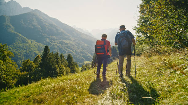 istock Active Senior Couple on Nature Trail Hike 2171640333