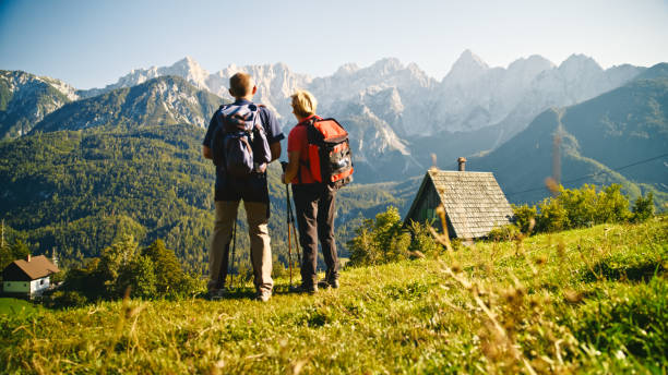 istock Senior Couple Enjoys Scenic Mountain View During Hike 2171640351