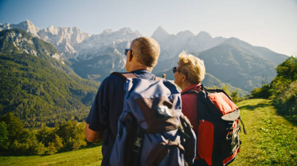 istock Senior Couple Appreciating Mountain Scenery on Hike 2171640353