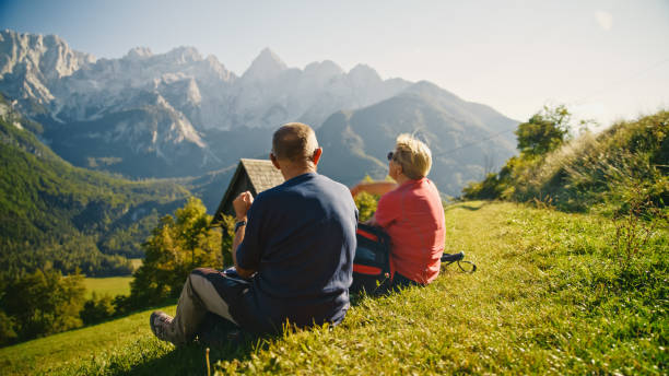 istock Elderly Couple Enjoys Mountain View on Hike 2171640354