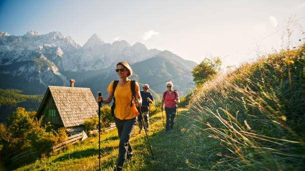 istock Diverse Hikers Trekking Mountain Trail at Sunrise 2171640371