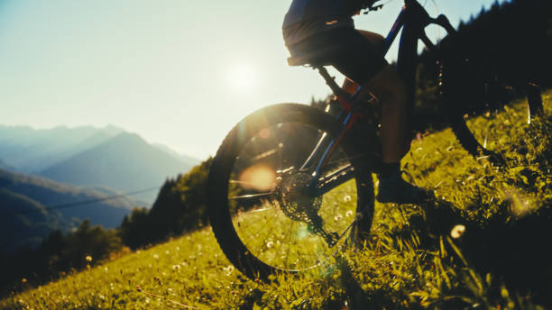 istock Female Cyclist's Sunset Ride Mountain Terrain Close Up 2171640394