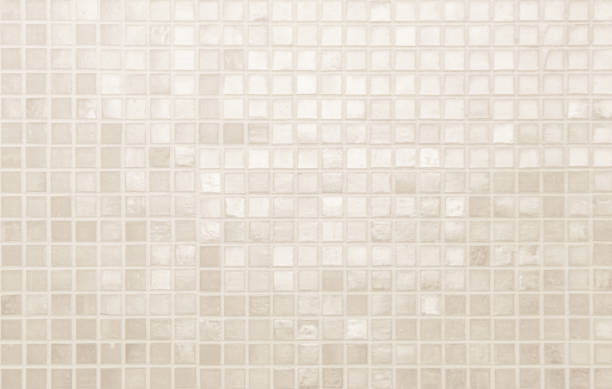 istock Cream light ceramic wall and floor tiles mosaic background in bathroom and kitchen. Design pattern geometric with grid wallpaper texture decoration pool. Simple seamless abstract surface clean. 2171643130