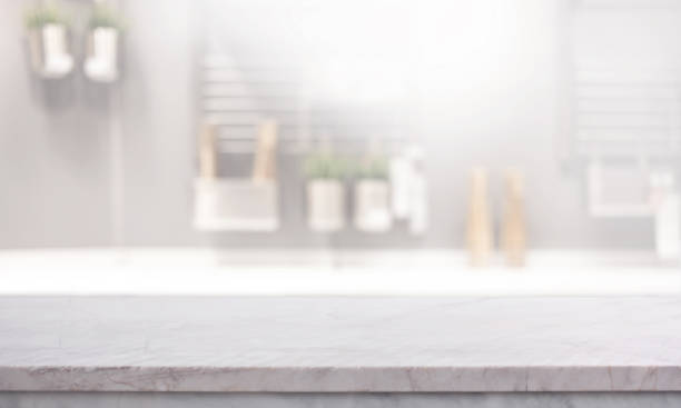 istock A marble countertop with blurred of a bright, modern kitchen.The soft focus on the interior background highlights.making it ideal for showcasing kitchen-related products 2171650189