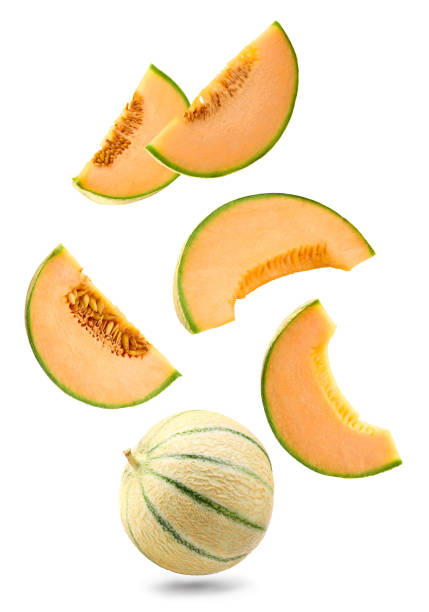 istock flying sliced cantaloupe melon isolated on white background. clipping path 2171654020