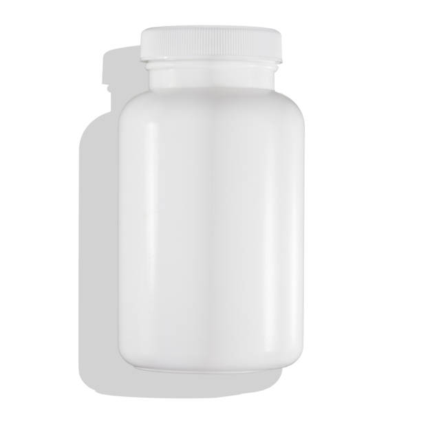 istock White medicine bottle, flat fly shot, isolated on white background with shadow. 2171654874