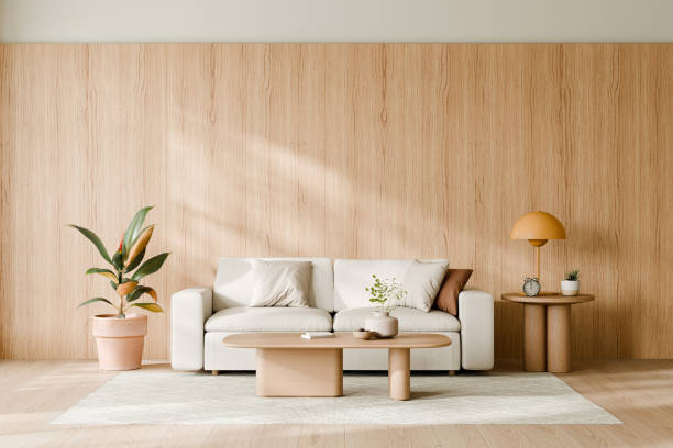 istock Contemporary living room with minimalistic design featuring a white sofa, wooden coffee table, potted plant, and an orange lamp, set against a wooden backdrop wall. 3d render. 2171657367