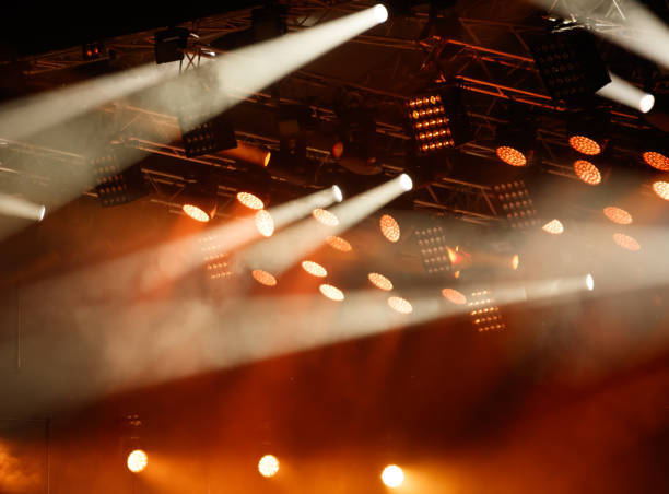 istock Red-orange color on stage at a concert 2171659090