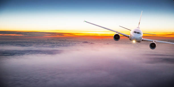 istock Commercial airplane flying above clouds 2171659524