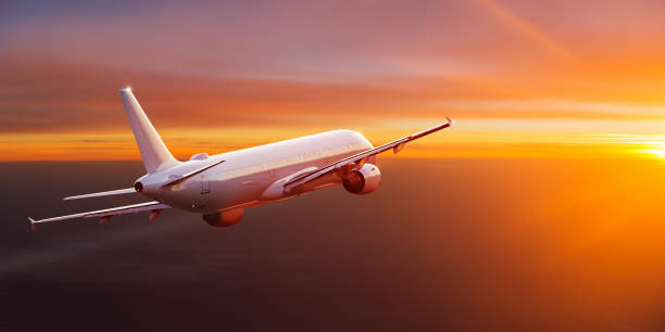 istock Commercial airplane flying above clouds 2171659557