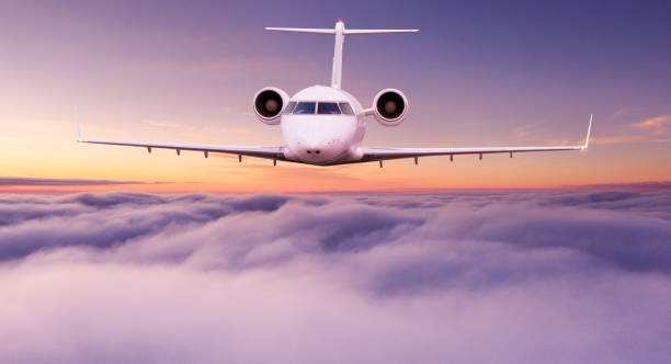 istock Commercial airplane flying above clouds 2171659565