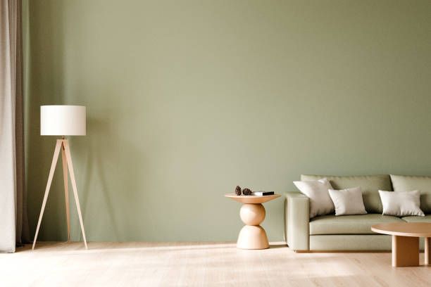 istock Minimalist living room featuring a sage green sofa, light wood coffee table and side table, neutral decor elements, 3d render. 2171660640