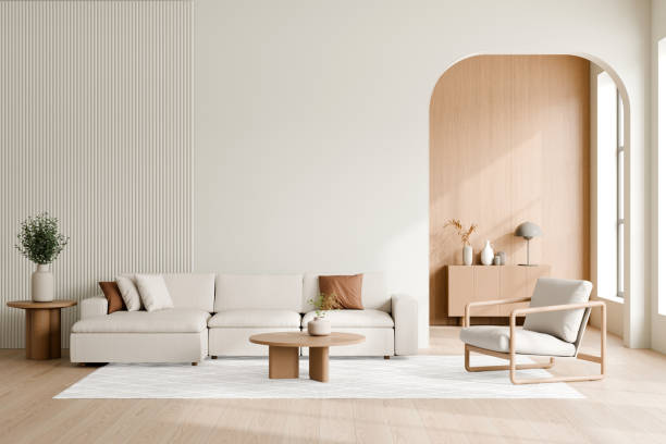 istock Bright and spacious living room featuring a beige sectional sofa, wooden coffee table, single armchair, and modern decor elements in a minimalist style. 3d render. 2171660674