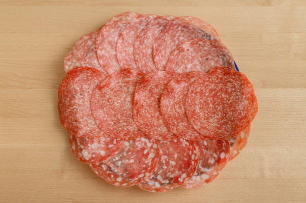 A plate full of sliced ​​Italian salami
