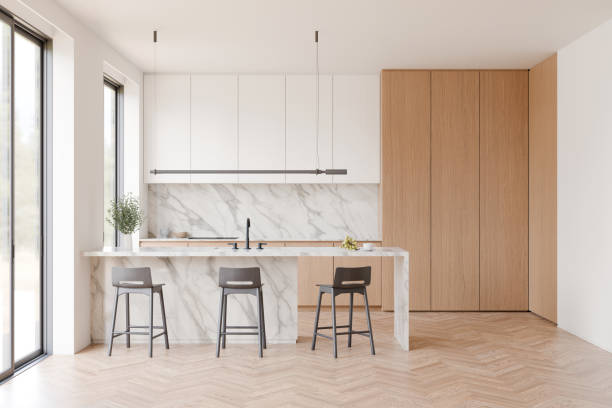 istock Minimal kitchen interior with white marble countertop, Black three bar stool, Light oak wooden parquet floor, Black window frame. 3d illustration. 2171663915