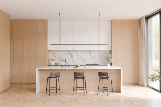 istock Modern kitchen interior with white marble countertop, Wood cabinet, Black three bar stool, Wood parquet floor, Black window frame. 3d illustration. 2171663924