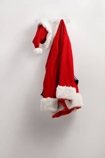 istock Santa claus costume and hat hanging 2171666520