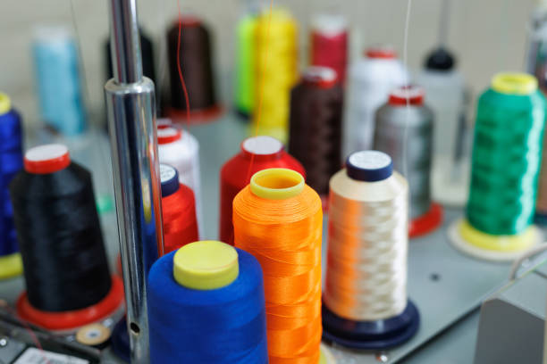 Set of multi colored threads of modern electronic professional embroidery machine