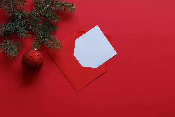 istock christmas card with red ornament and pine branch 2171669516